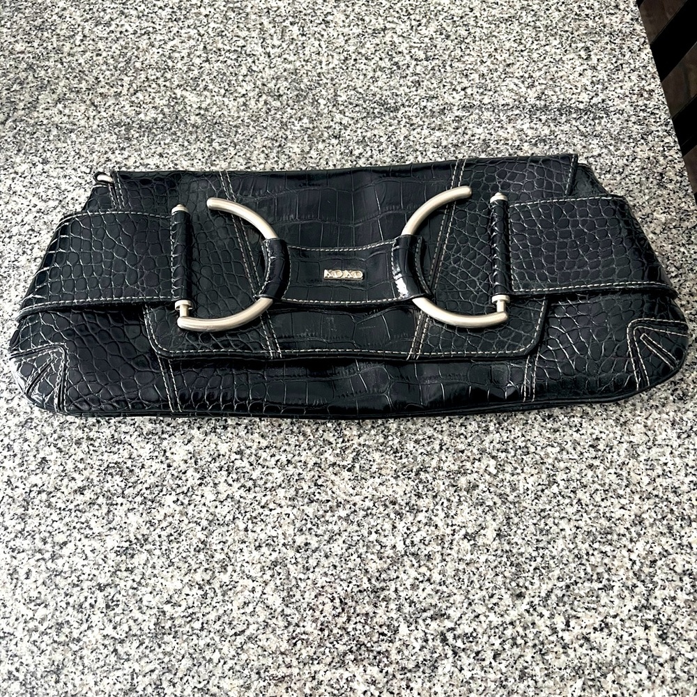 XOXO black clutch...shoulder strap included.
